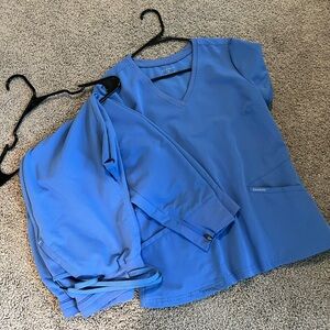 JAANUU two pocket top and zip joggers set
